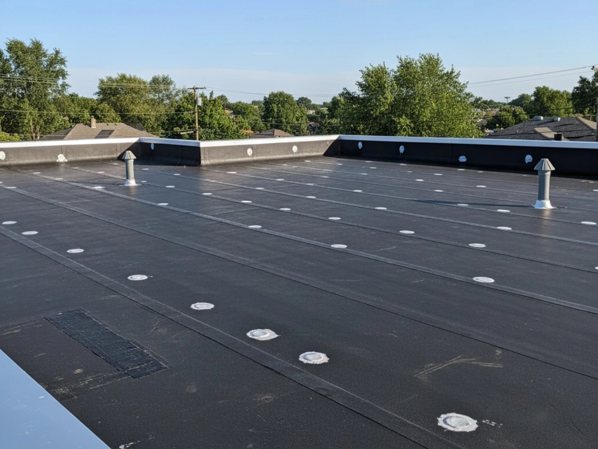 Snow and Ice Roof Damage Insurance Claims in Lansing, MI