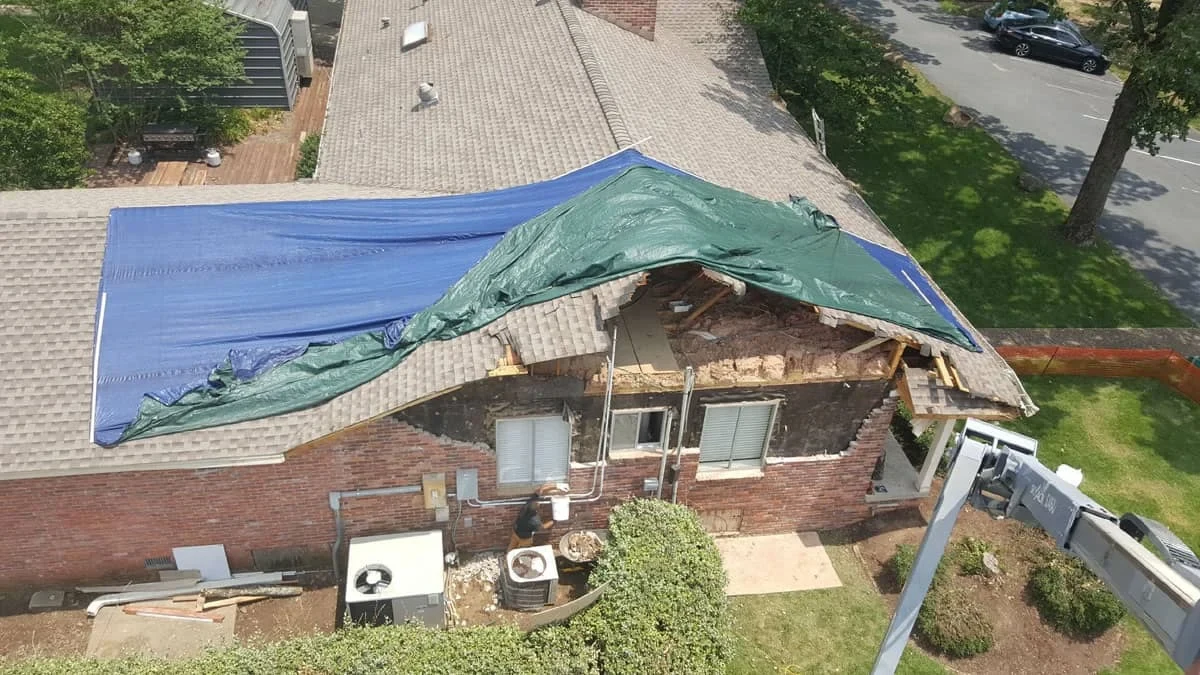 Repairing Lansing Roofs After Wind, Ice, and Derecho Damage